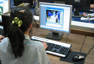 A student working on her project on computer