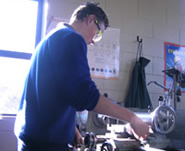 Students working on a lathe