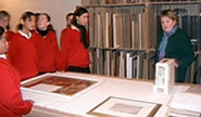 Museum Collections Officer Ann Milton talking to the girls
