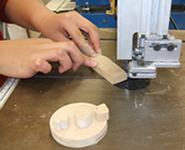 Cutting out wood for name stand