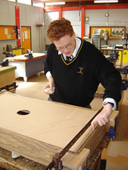 James working on his table