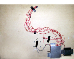 The electronic scoring system wired to the backboard