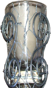 Kataraina's glass and wire candle holder with koru designs