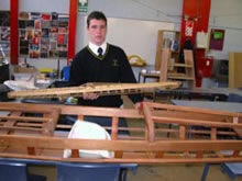 Sam with his kayak and prototype
