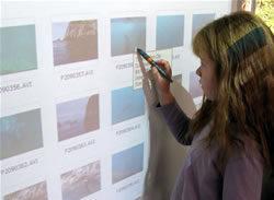 Student using the interactive whiteboard