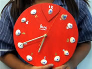 Paige holding her clock