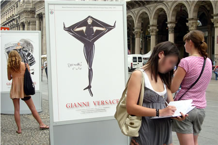 Students drawing by the Versace exhibition in Milan, Italy
