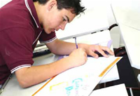 A student working on his design