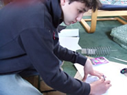 Student adding to design