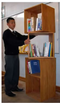 Tian Liu with his bookshelf