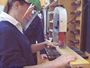 Student cutting wood