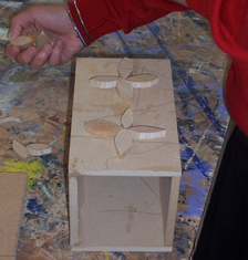 Finished Time Capsule with unpainted Pacific Island style leaf decorations