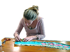Jessica working on her dress