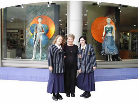 Sarah and Eloise in front of the window displays