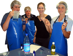 Nicola Dale, Food Technologist with Sensient Technologies New Zealand, with students from Carolyn's Year 11 Food Technology class.